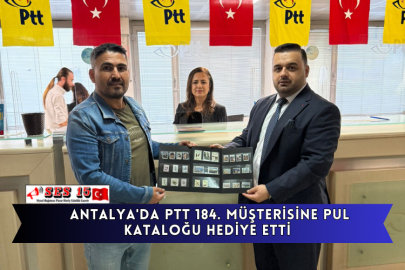 Antalya'da PTT 184. Müşterisine Pul Kataloğu Hediye Etti
