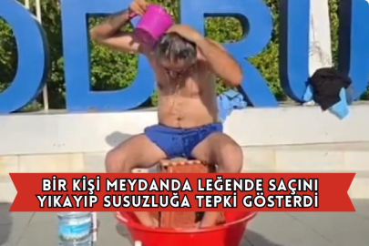 Bir Kişi Meydanda Leğende Saçını Yıkayıp Susuzluğa Tepki Gösterdi